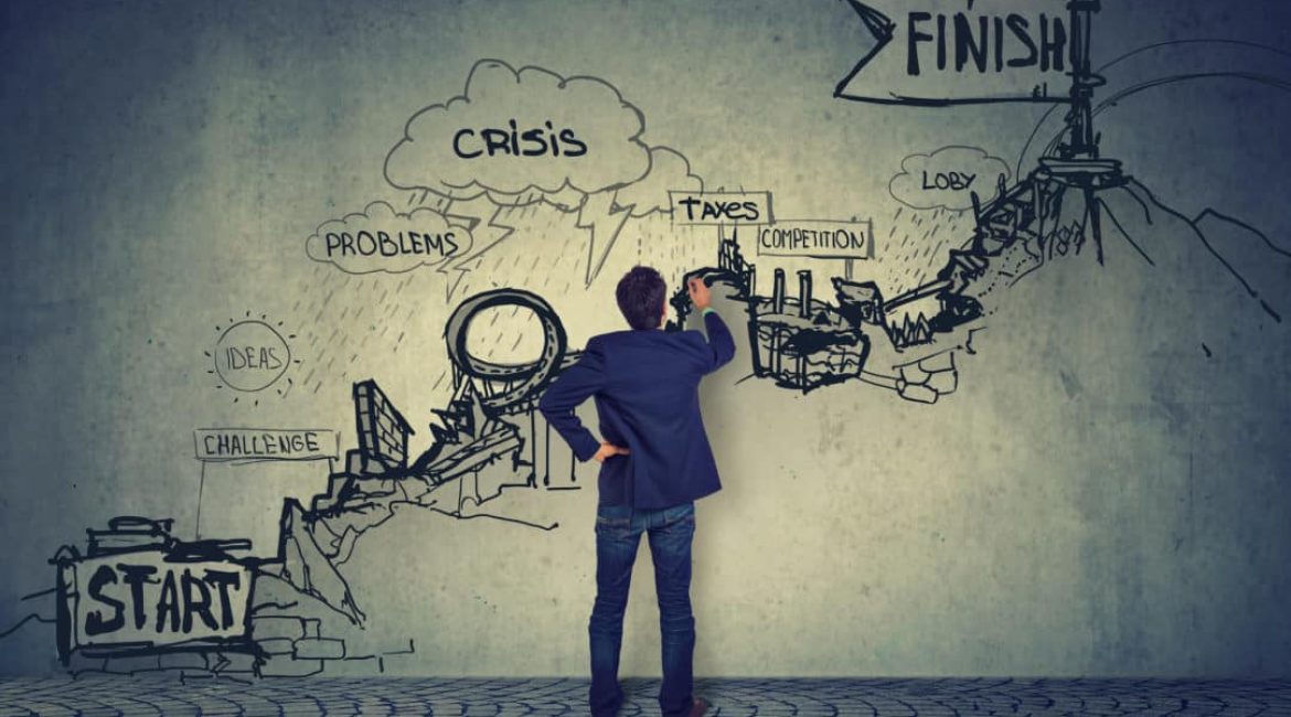 Business career challenges concept. Businessman looking at a sketch of troubles on the way up